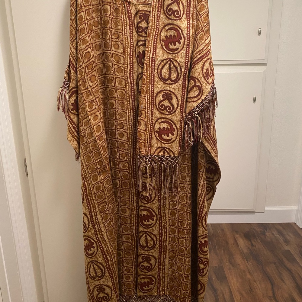 Kraftan with head wrap or can use to wrap around waist